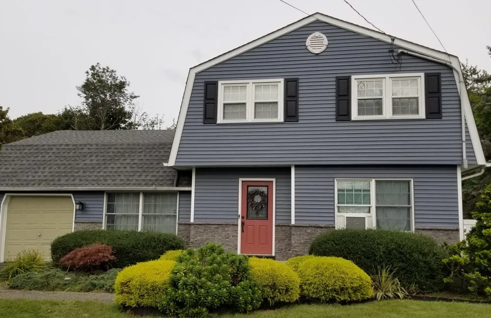 Slide of The Vinyl Siding Guys