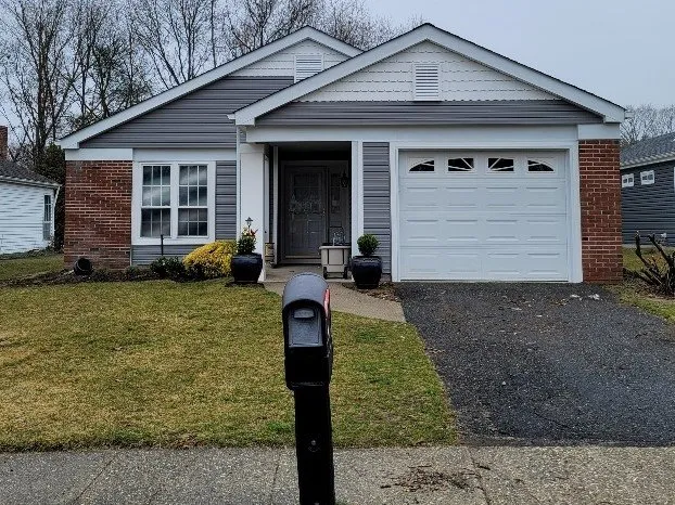 Slide of The Vinyl Siding Guys