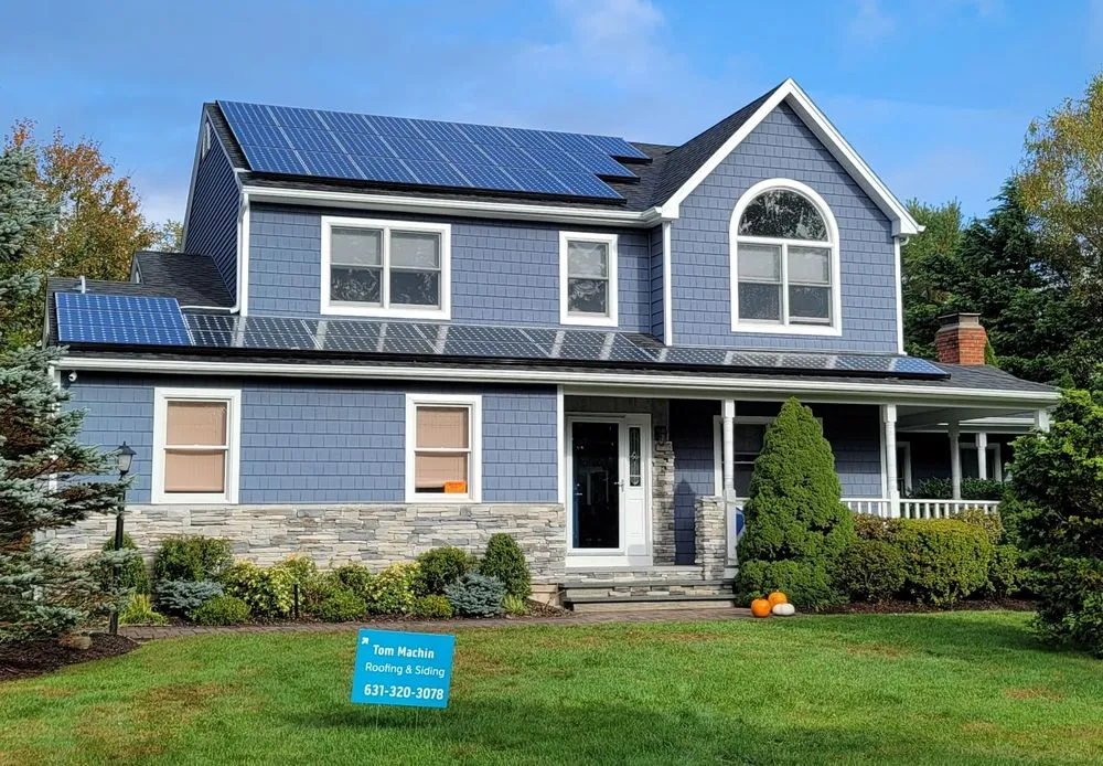 Slide of The Vinyl Siding Guys