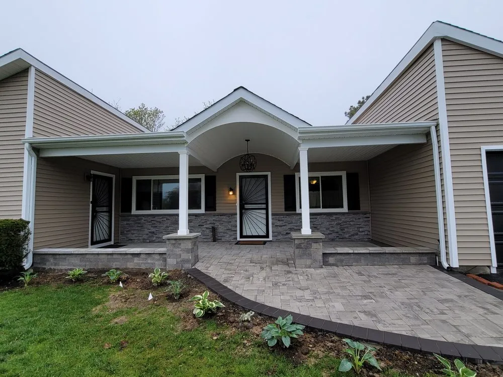 Slide of The Vinyl Siding Guys