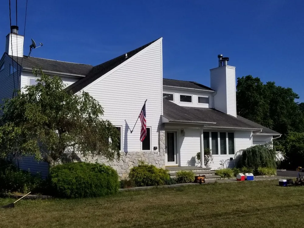 Slide of The Vinyl Siding Guys