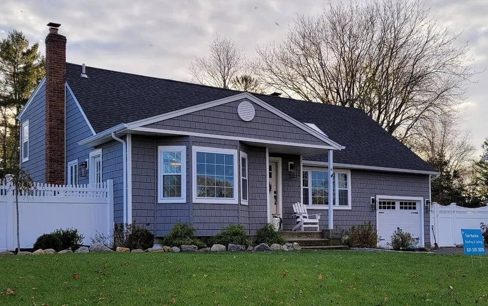 Slide of The Vinyl Siding Guys