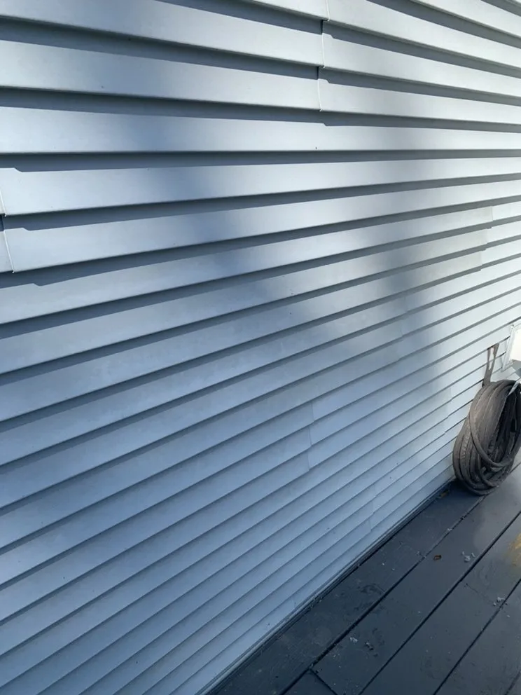 Professional shingle roofing service in East Fairfield, VT by The Waterboy House Washing