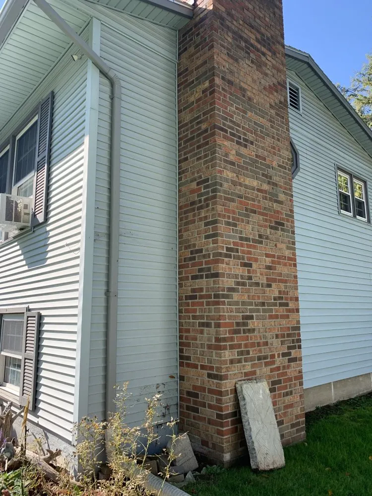 Professional flat roof repair in East Fairfield, VT by The Waterboy House Washing