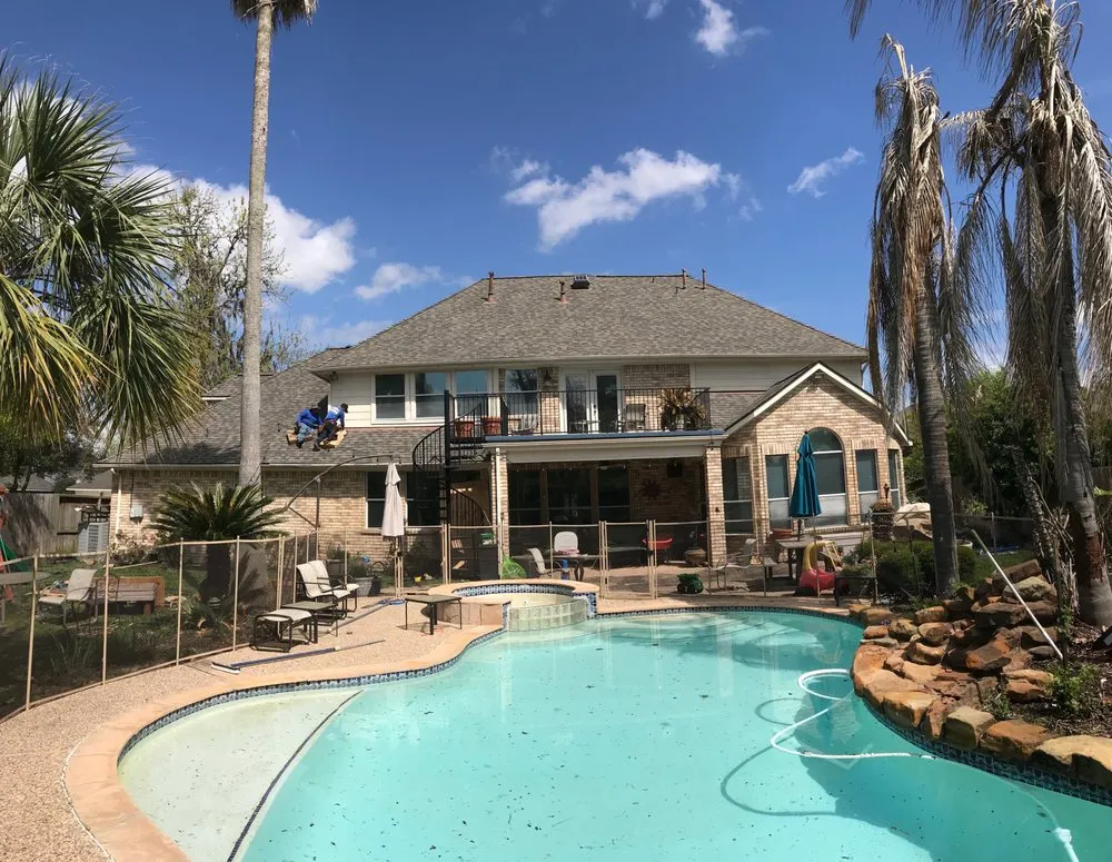 Slide of The Woodlands Premier Roofing