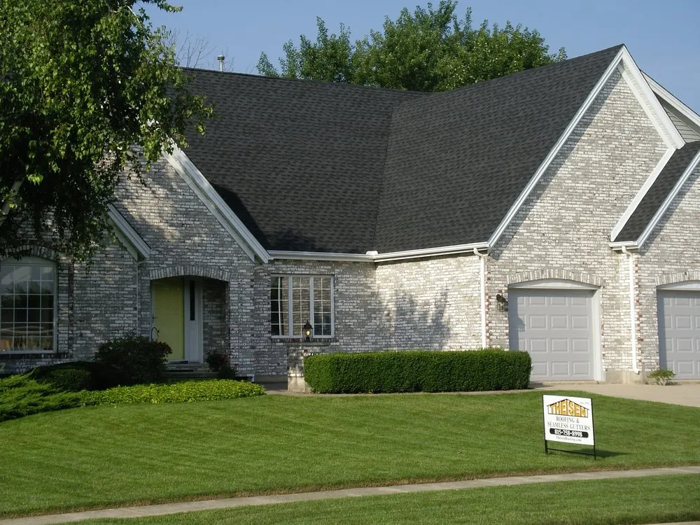 Slide of Theisen Roofing & Siding