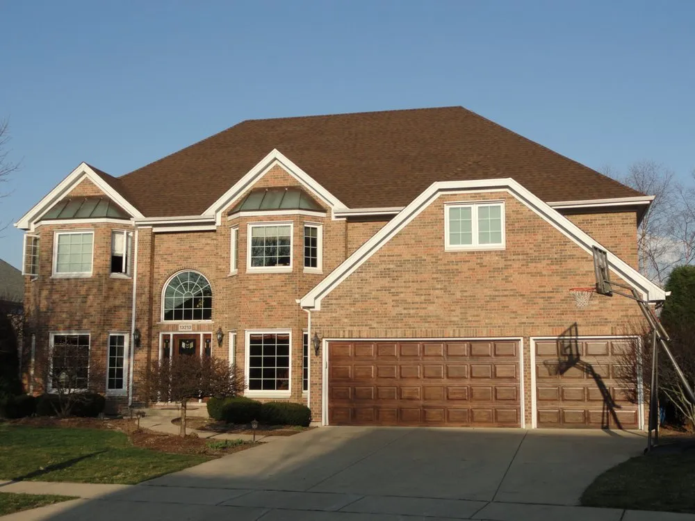 Slide of Theisen Roofing & Siding