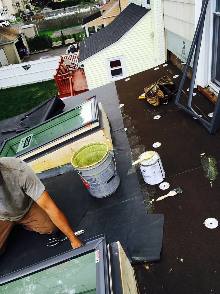 Slide of Thomas Burke Roofing & Gutters