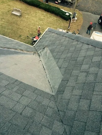 Slide of Thomas Burke Roofing & Gutters