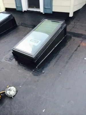 Slide of Thomas Burke Roofing & Gutters