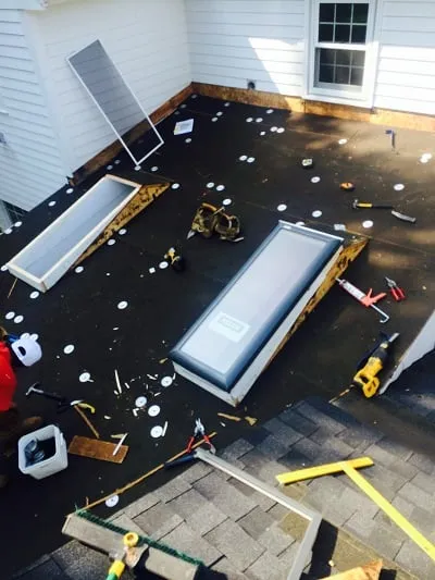 Slide of Thomas Burke Roofing & Gutters