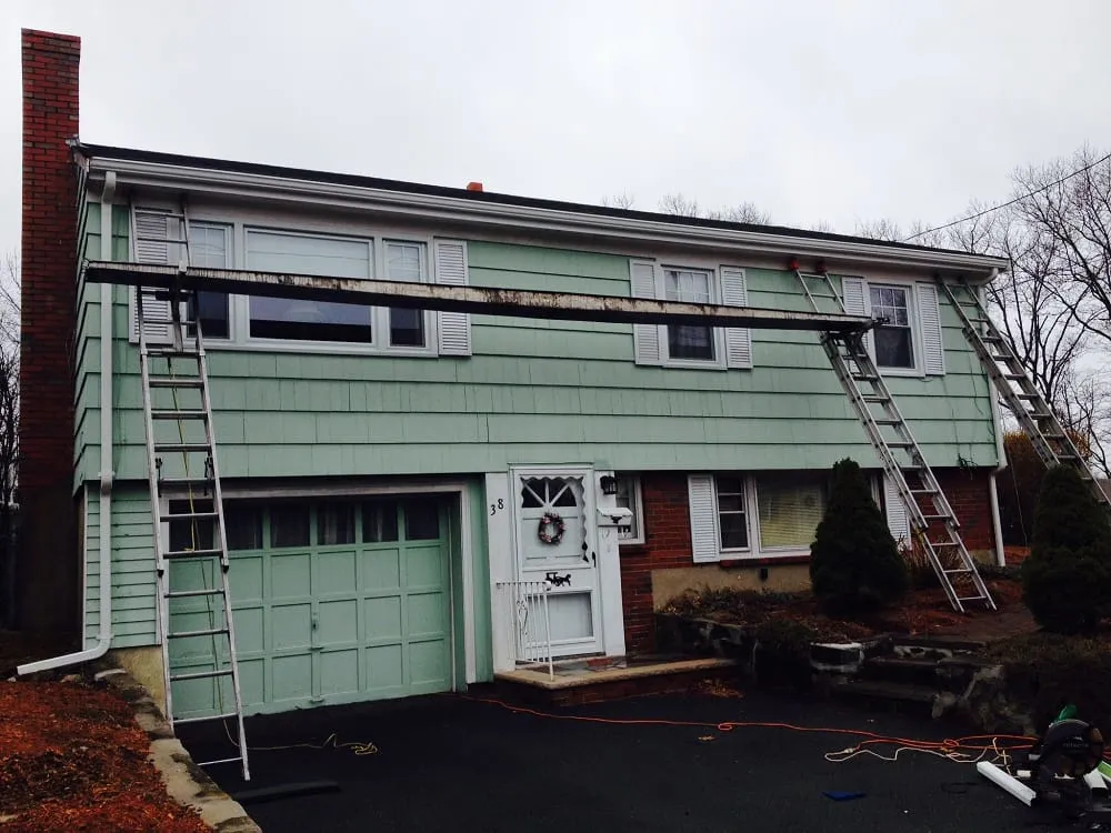 Slide of Thomas Burke Roofing & Gutters