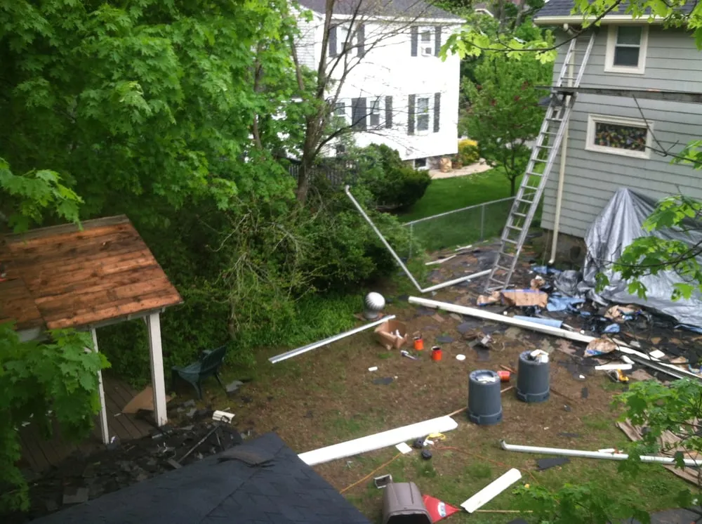 Slide of Thomas Burke Roofing & Gutters