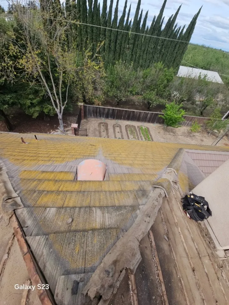 Slide of Thomas Ford Roofing