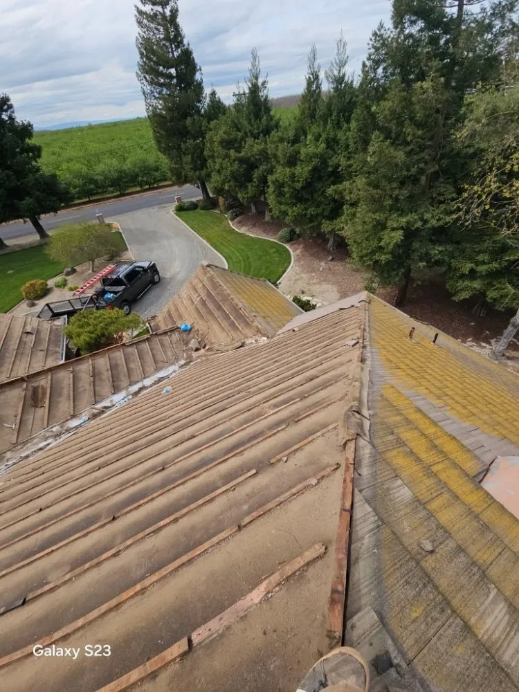 Slide of Thomas Ford Roofing