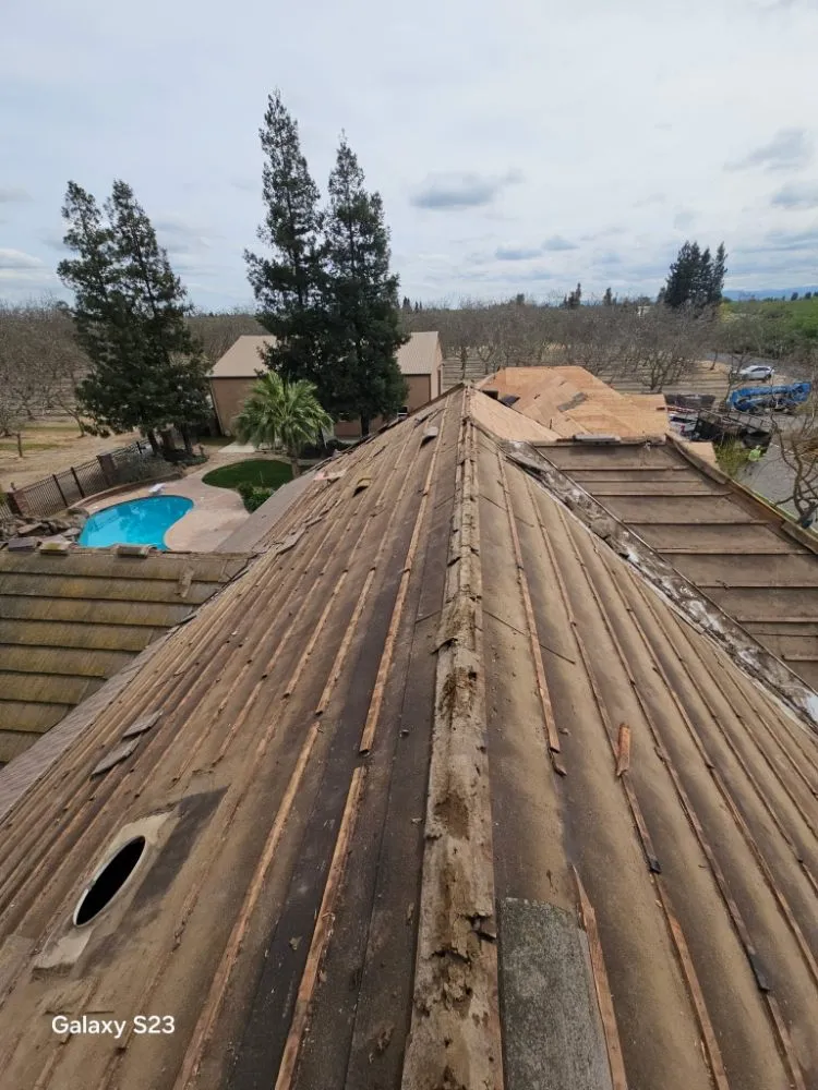 Slide of Thomas Ford Roofing