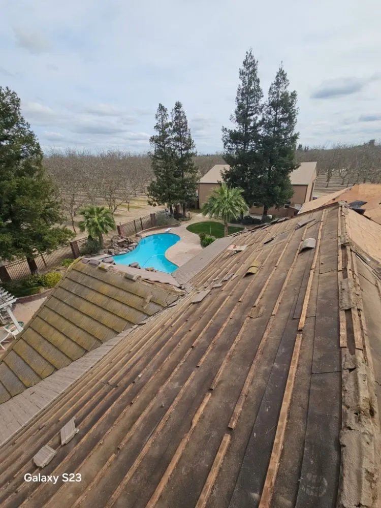 Slide of Thomas Ford Roofing