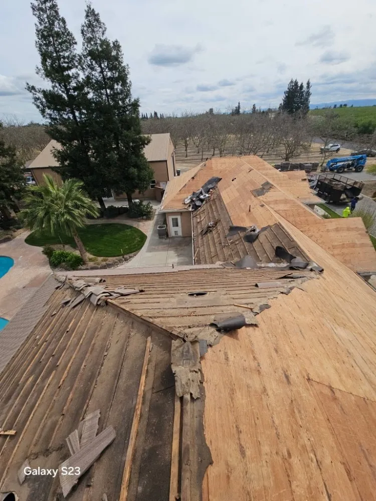 Slide of Thomas Ford Roofing