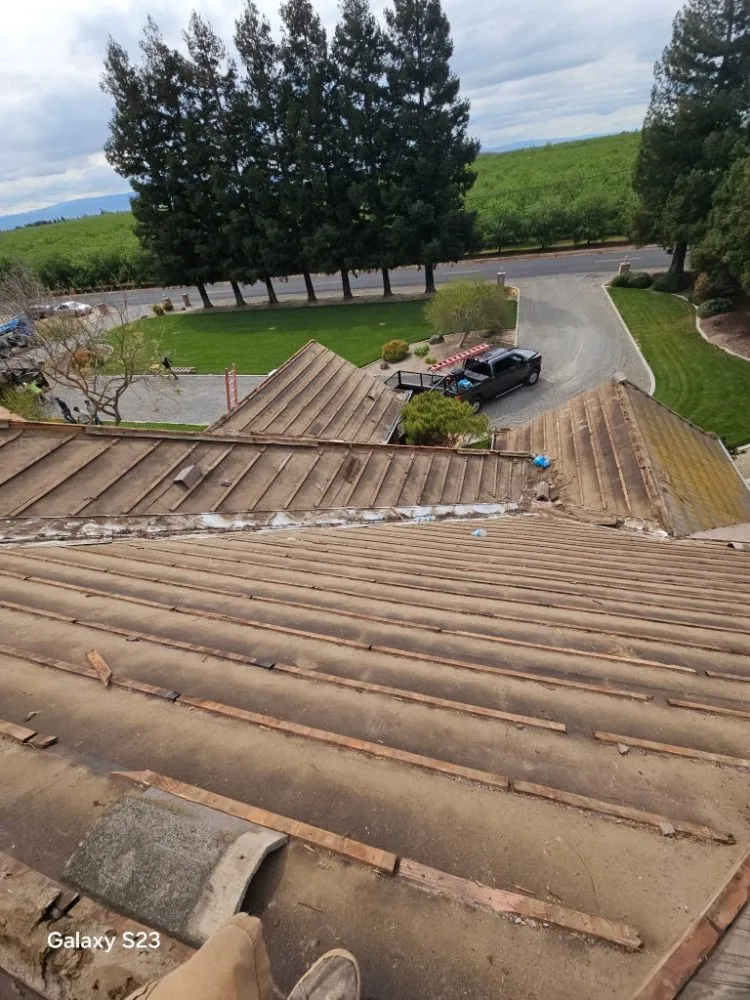 Slide of Thomas Ford Roofing