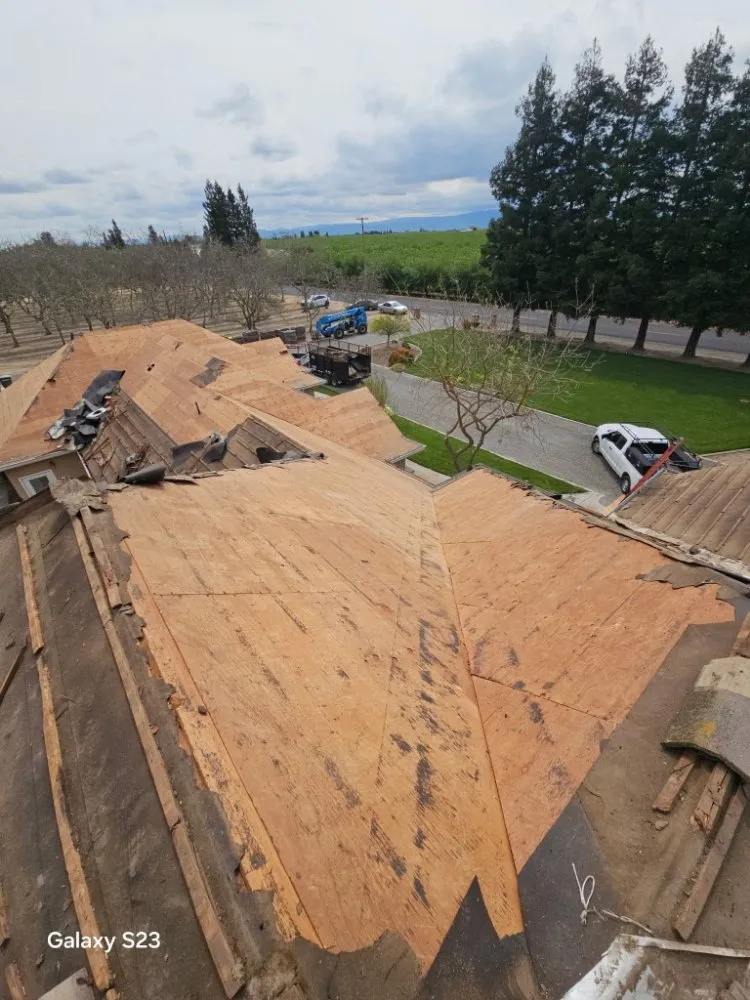Slide of Thomas Ford Roofing