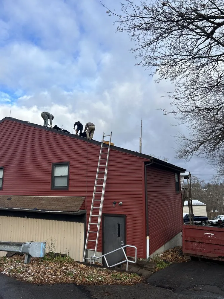 Top-rated storm damage roof repair after storm damage in South Heights, PA by Thomas Painting & Remodeling