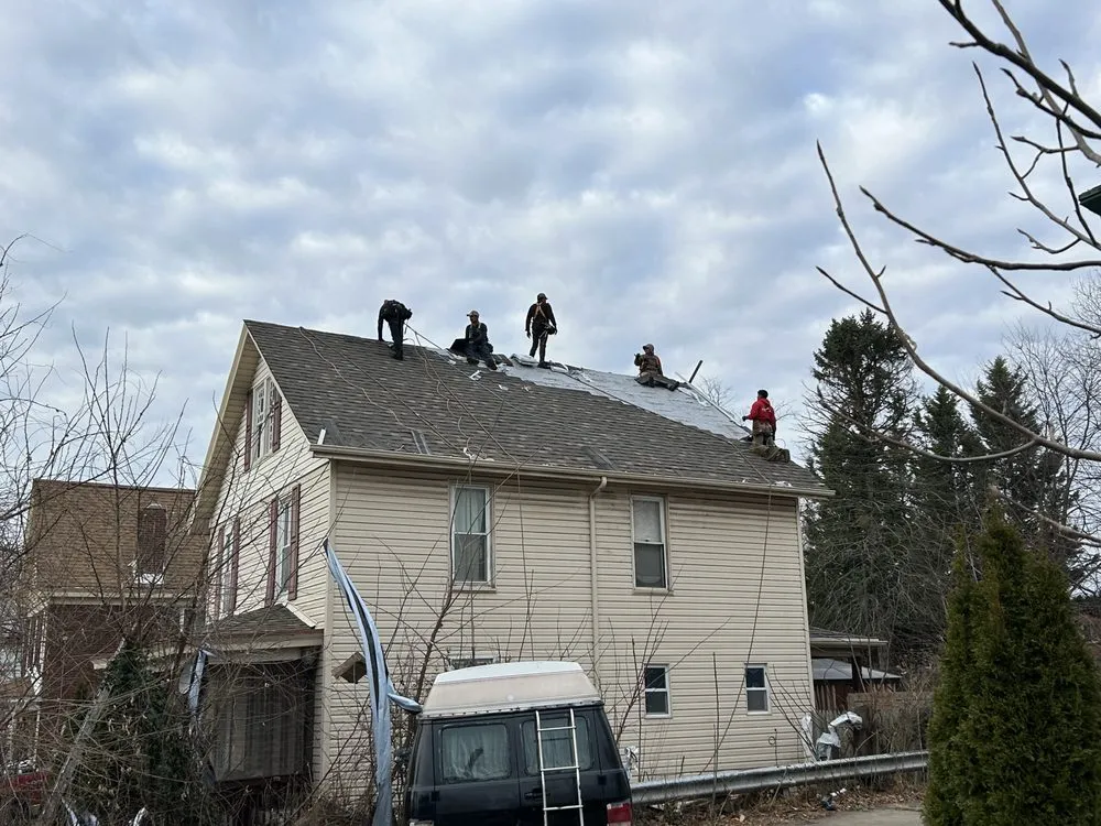 Licensed storm damage roof repair in South Heights, PA by Thomas Painting & Remodeling