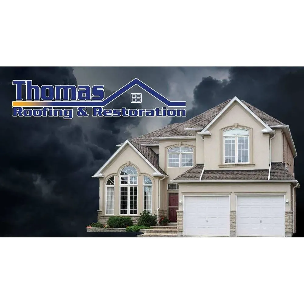 Slide of Thomas Roofing & Restoration