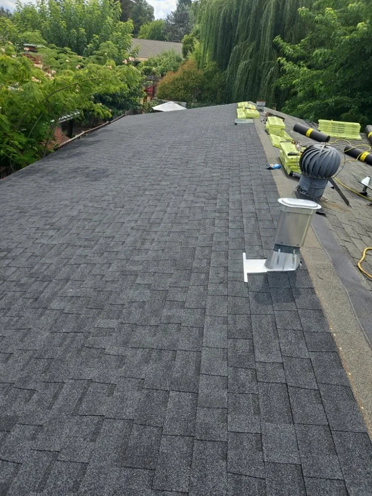 Slide of Thomas Roofing