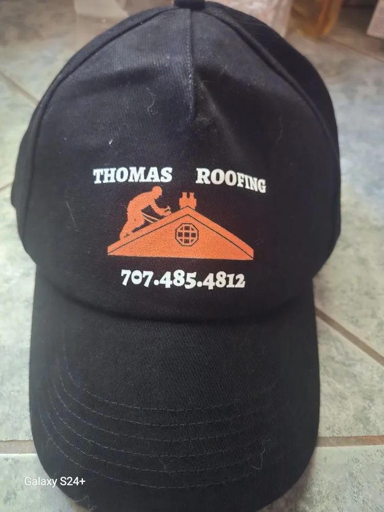 Slide of Thomas Roofing