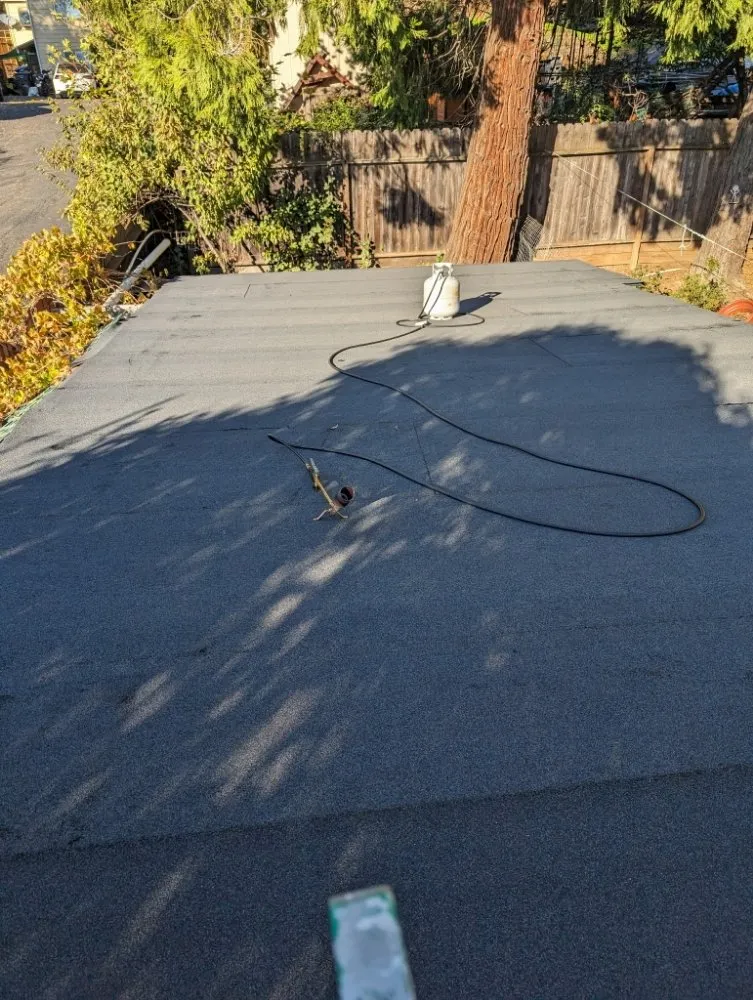 Slide of Thomas Roofing