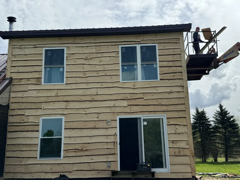 Local flat roof repair in Lacona, NY by Thomas Trump Construction