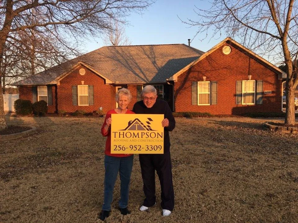 Slide of Thompson Roofing and Construction