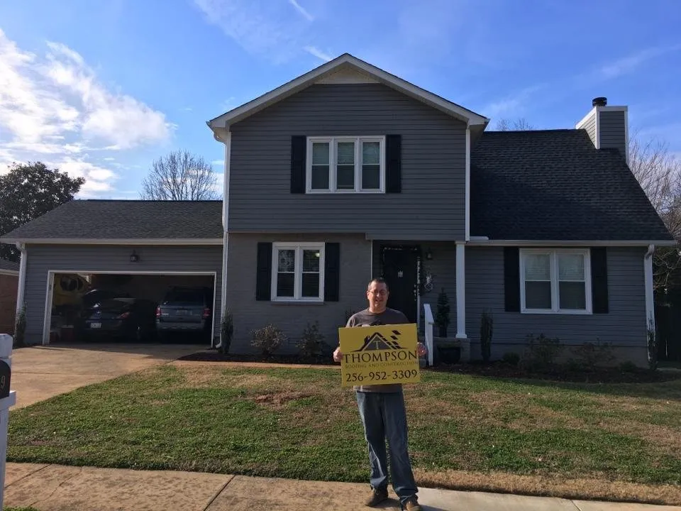 Slide of Thompson Roofing and Construction