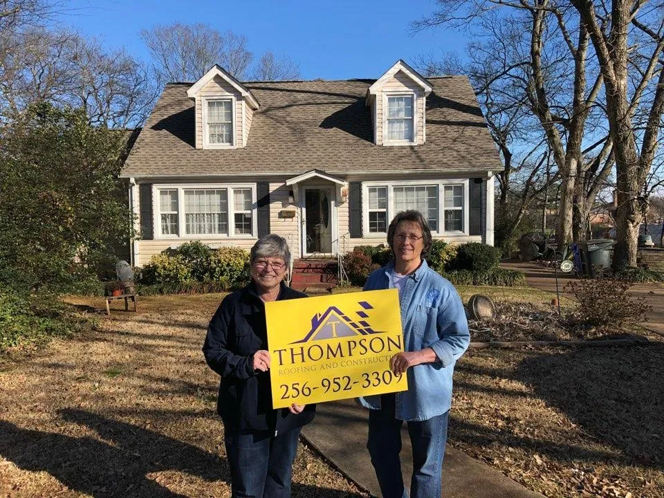Slide of Thompson Roofing and Construction
