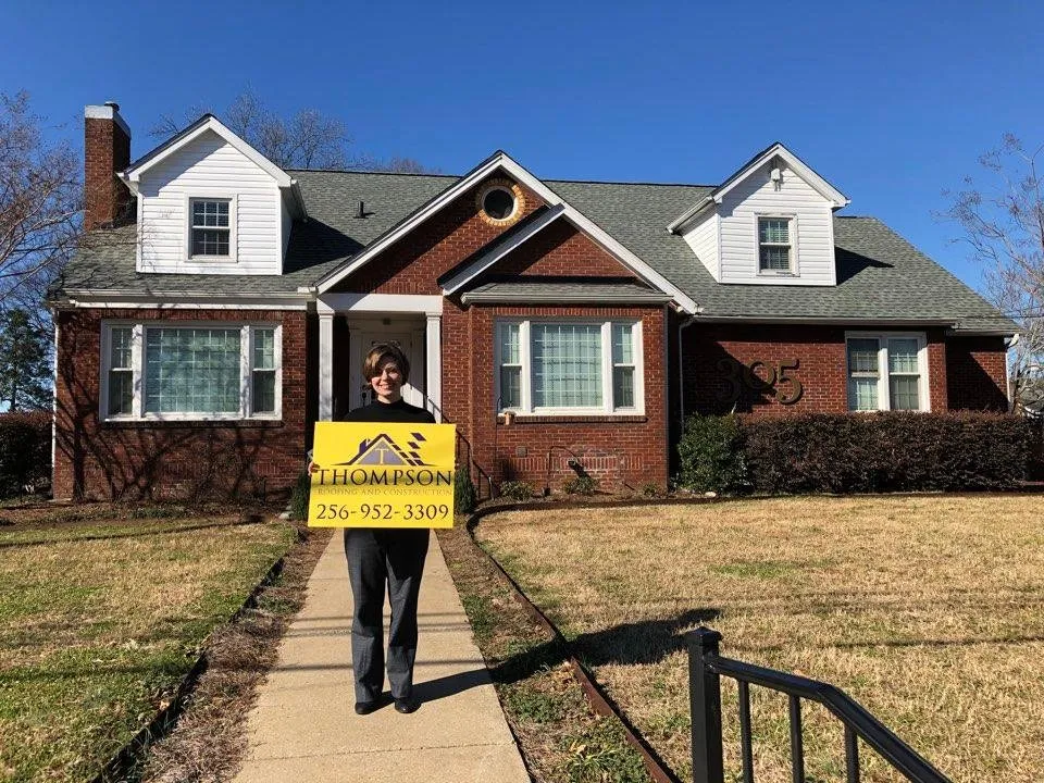 Slide of Thompson Roofing and Construction