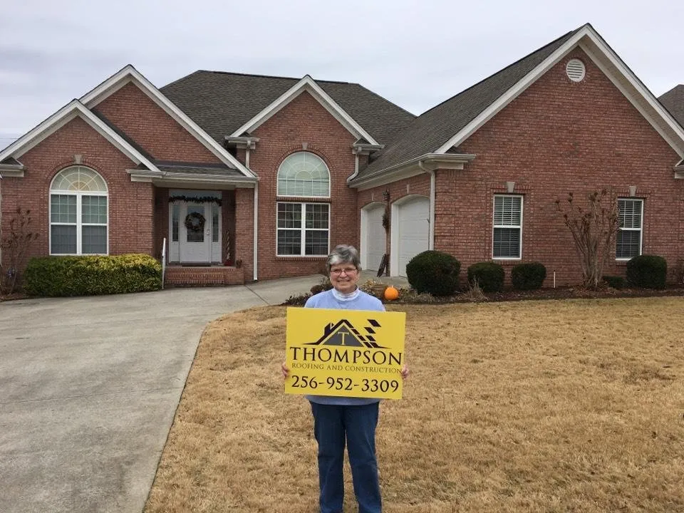 Slide of Thompson Roofing and Construction