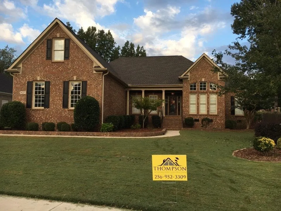 Slide of Thompson Roofing and Construction
