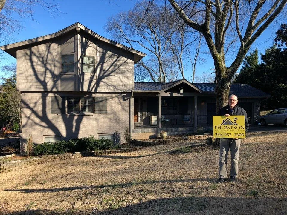 Slide of Thompson Roofing and Construction