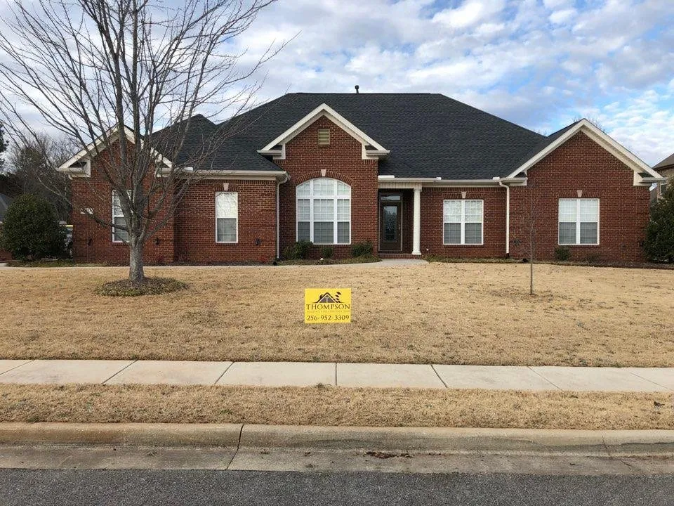 Slide of Thompson Roofing and Construction