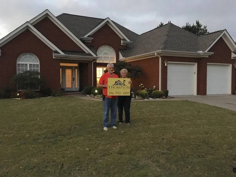 Slide of Thompson Roofing and Construction