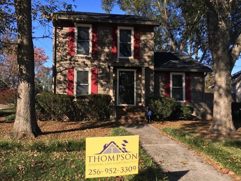 Slide of Thompson Roofing and Construction