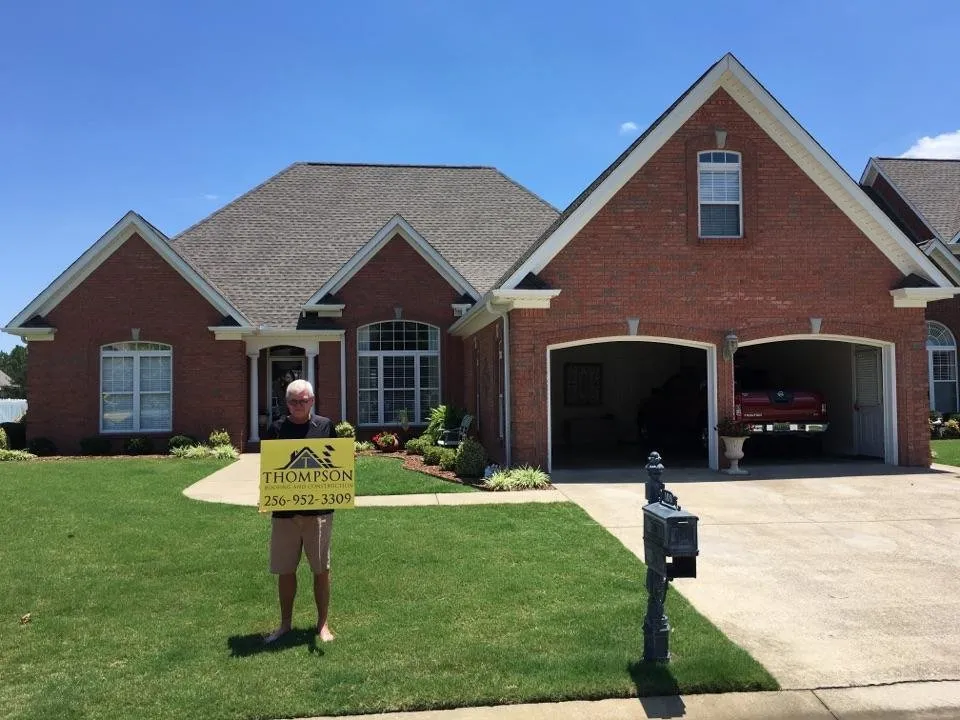 Slide of Thompson Roofing and Construction