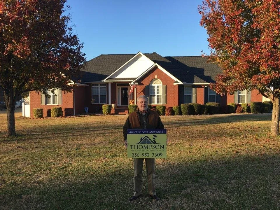 Slide of Thompson Roofing and Construction