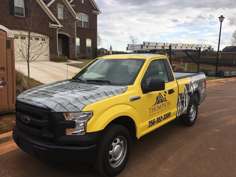Slide of Thompson Roofing and Construction
