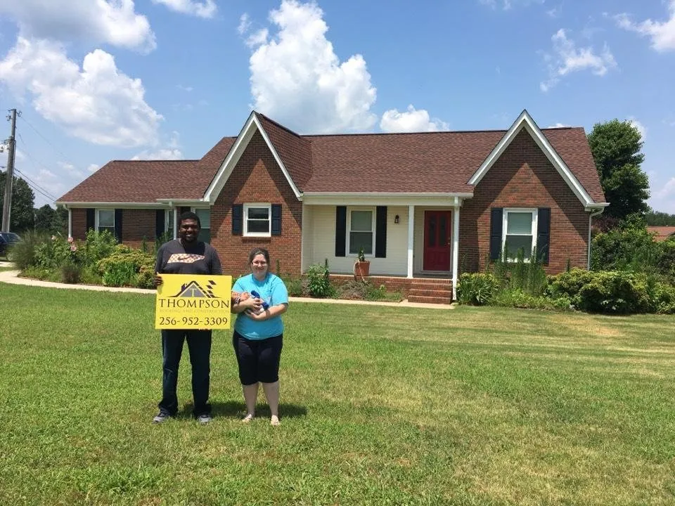 Slide of Thompson Roofing and Construction