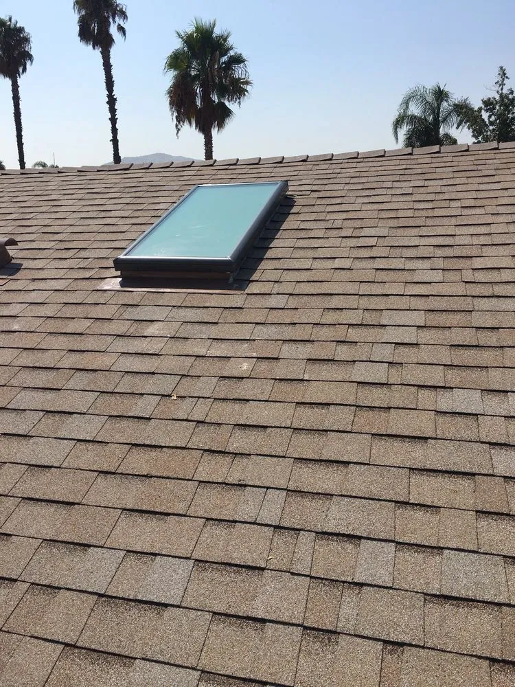 Slide of Thompson Roofing