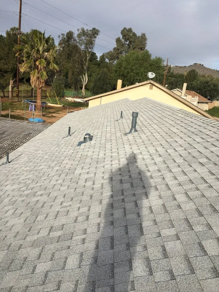 Slide of Thompson Roofing