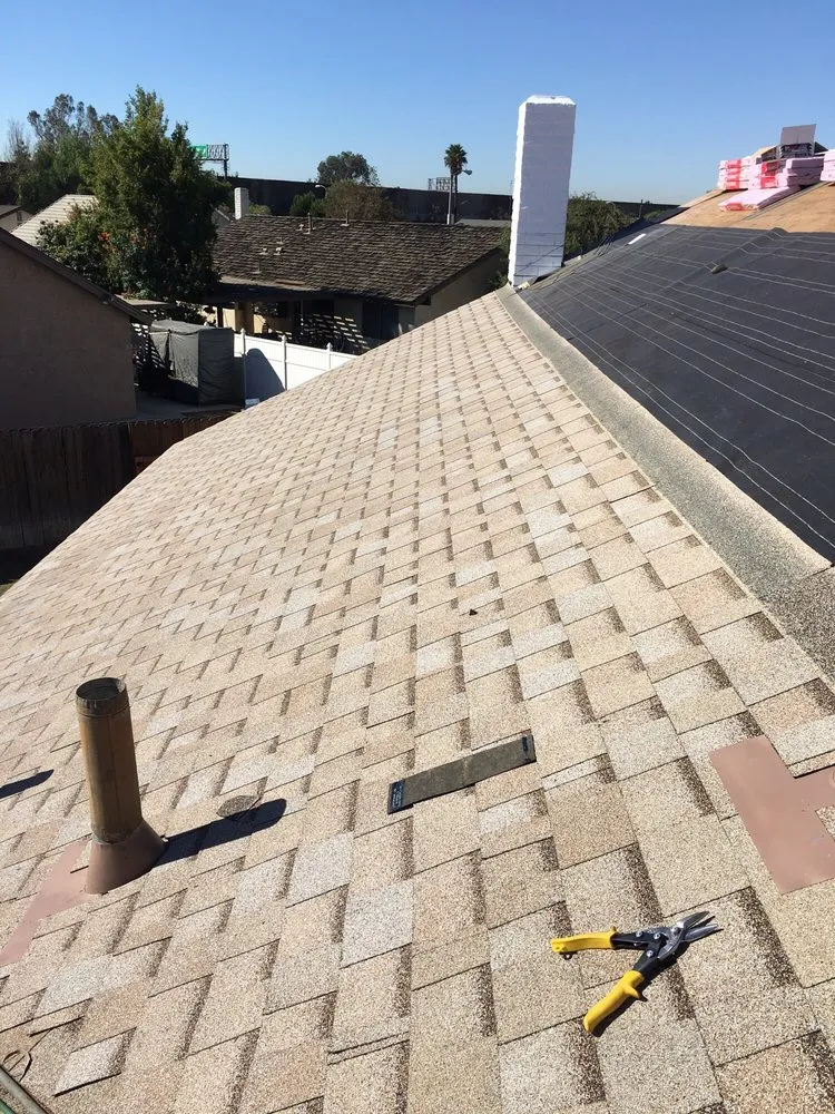 Slide of Thompson Roofing