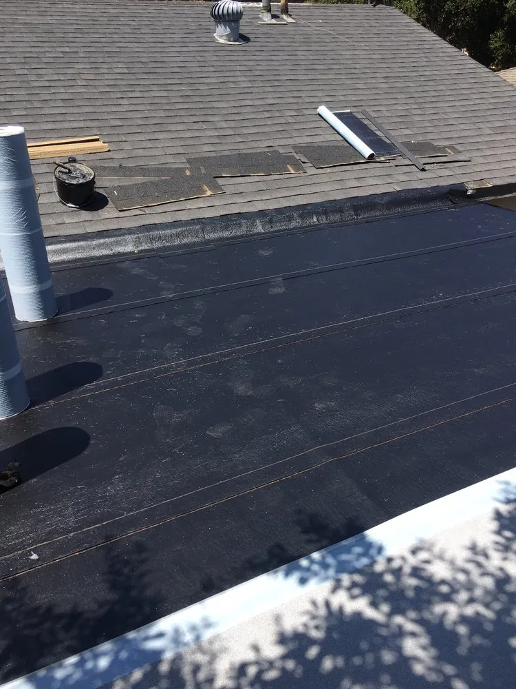 Slide of Thompson Roofing