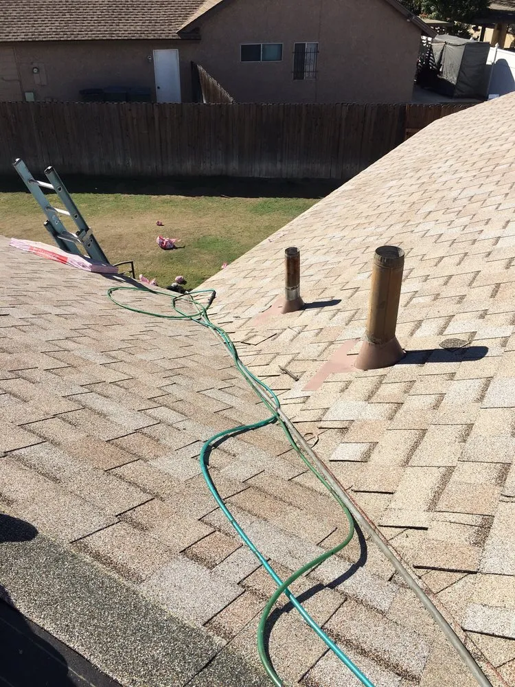 Slide of Thompson Roofing